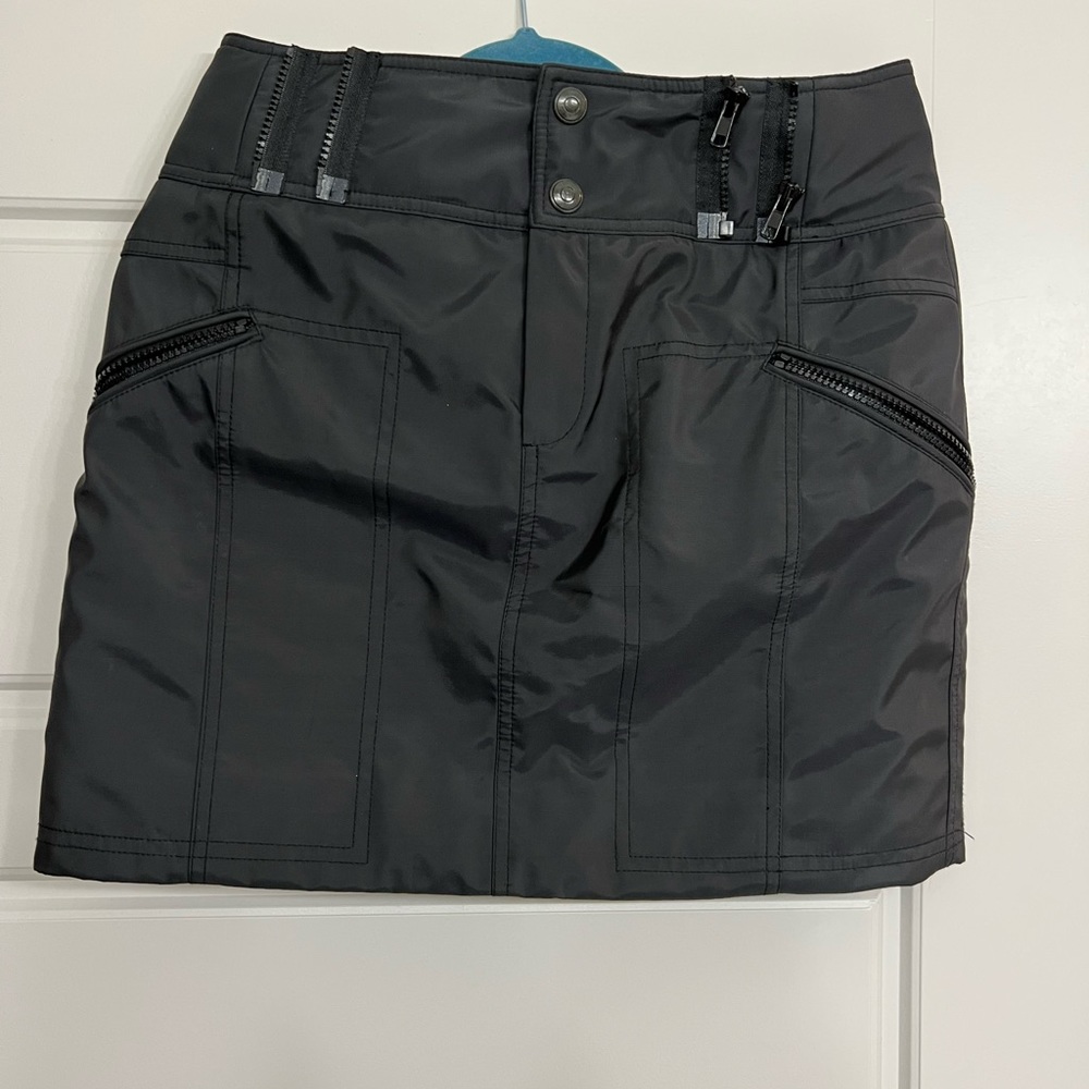 Winter skirt. Leather-winter jacket look. Looks great with tights.